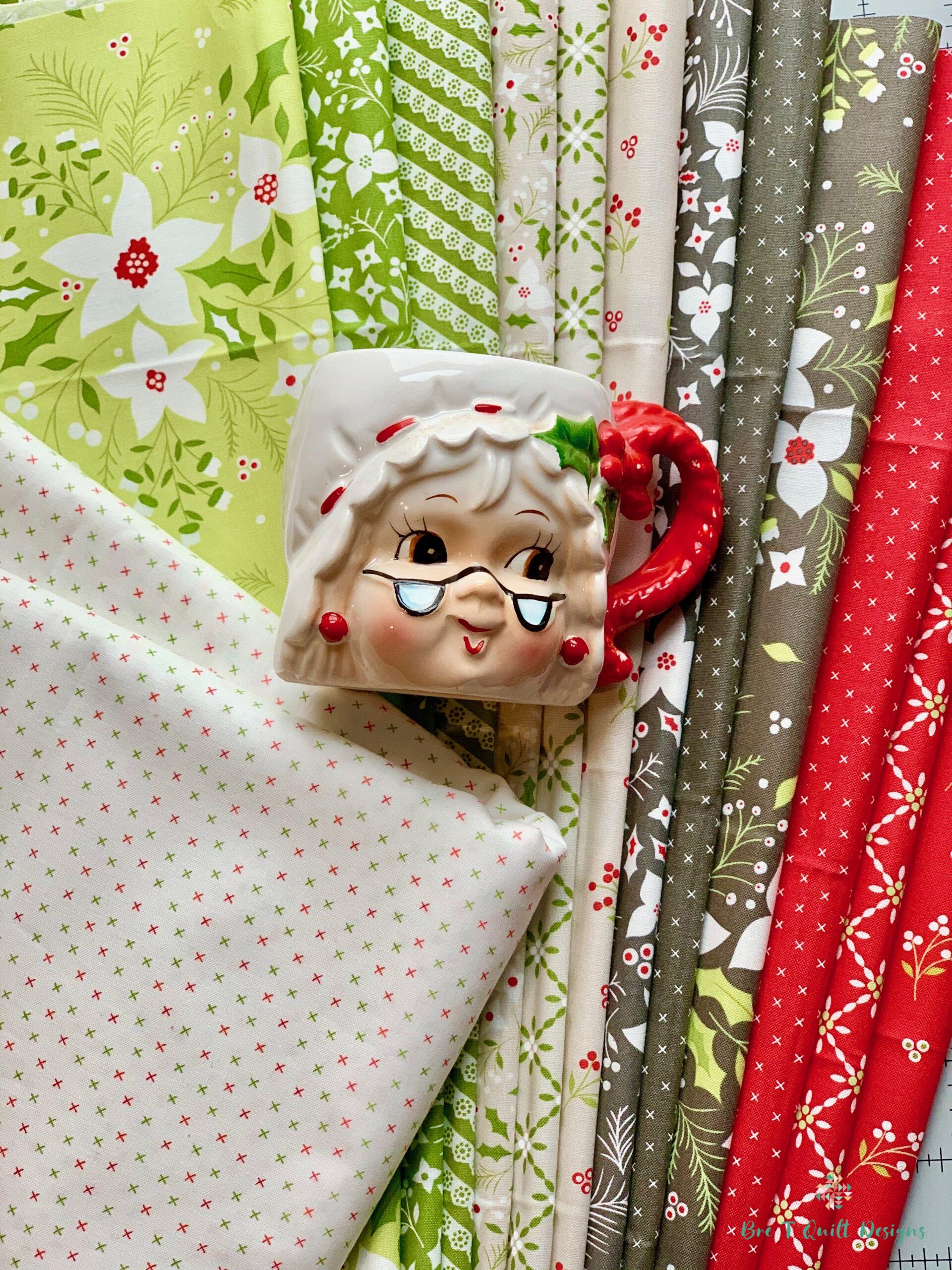 Holliberry by Corey Yoder Fabric Pull for Bright Stars Quilt By Elisa & Higgs shown with vintage Mrs. Clause Mug 