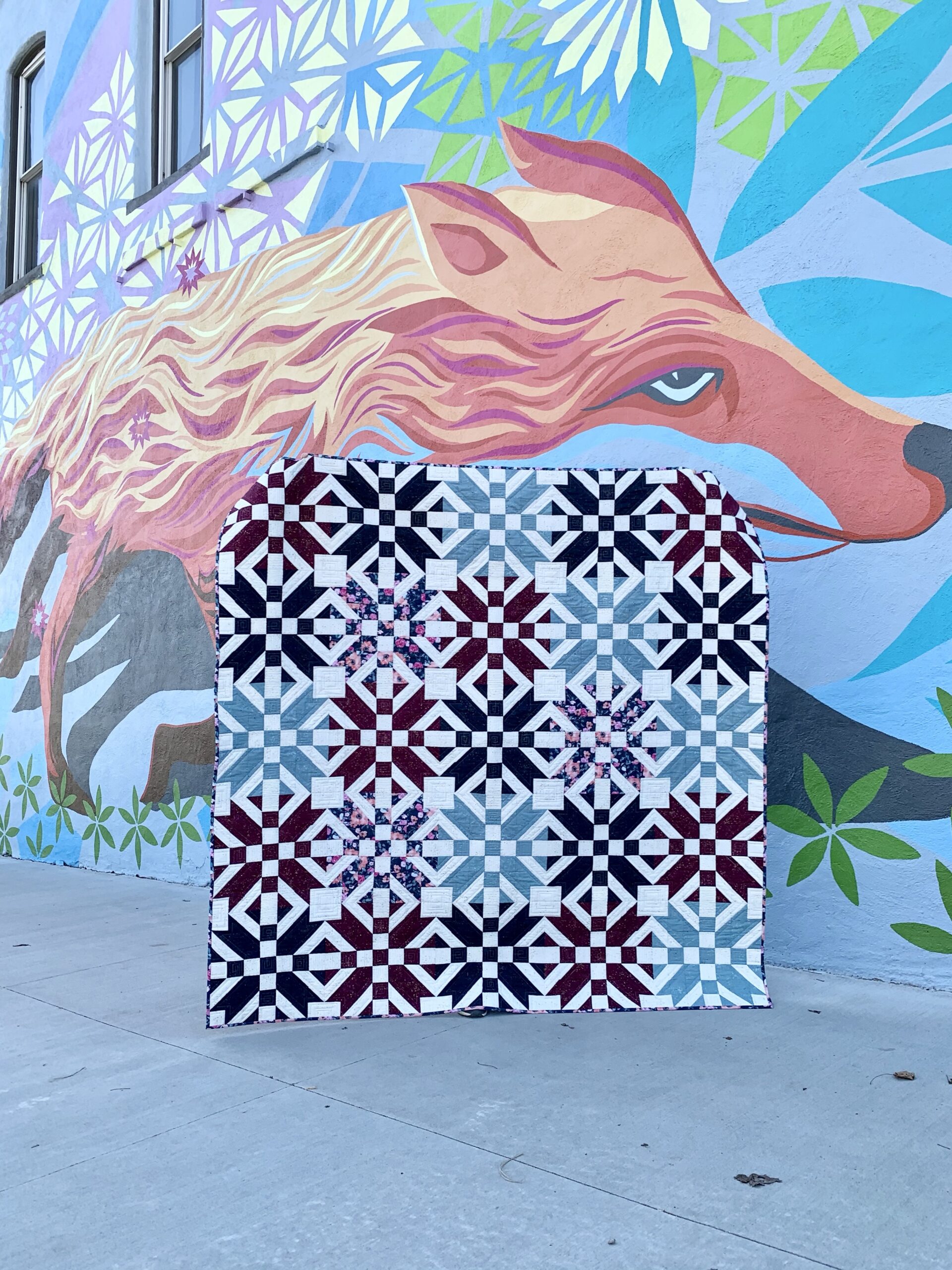 Adelyn Kay Quilt Pattern In Front Of Fox Mural