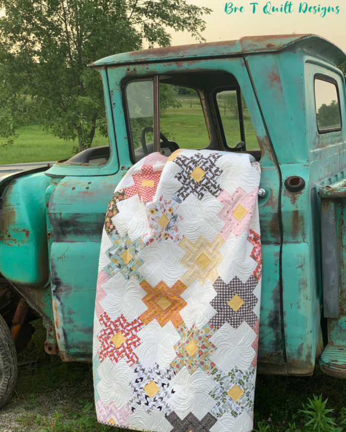 Clover Fields Quilt In Poppy Cotton On Vintage Truck