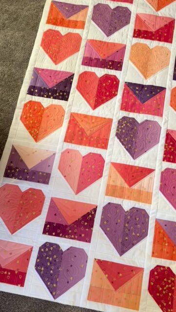 Just got these back from @kellyannquilts, not only did she finish them in record time, I am absolutely obsessed!  Love Letters is gorgeous as always, but the real show stopper is the custom quilting on Switchback Rails.  She turned a simple pattern into a stunning quilt! 

I’m off to bind these and get more photographs! 

Patterns: Love Letters & Switchback Rails (link in my bio)
Fabric: I Heart Ombré @vchristenson @modafabrics 

#customquilting #heartquilt #valentinesquilt #quilting #quiltpattern