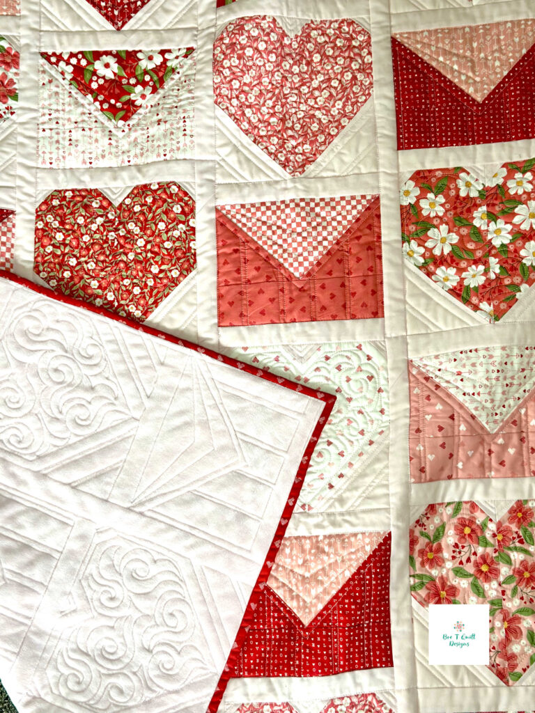 Light pink minky backing on the Love Letters heart quilt pattern for Valentine’s Day