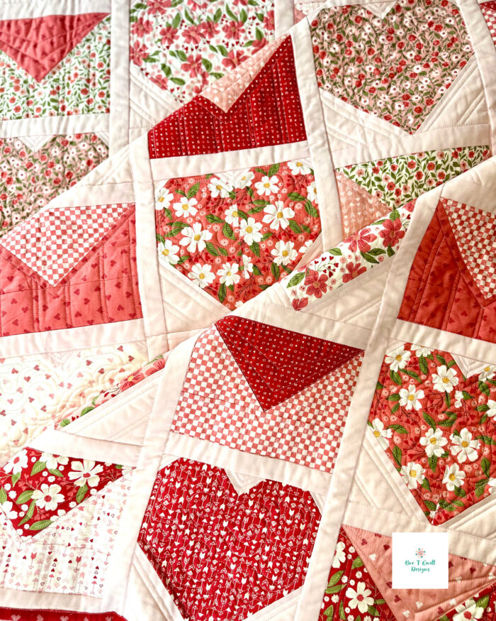Close-up of custom quilting on the Love Letters Valentine’s Day heart quilt pattern by Kelly Borns