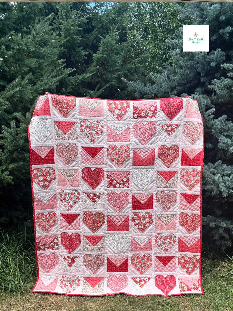 Love Letters Valentine’s Day heart quilt pattern made with Love Blooms fabric by Lella Boutique