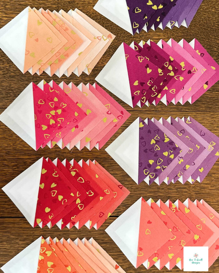 half-square triangles in a valentines fabric