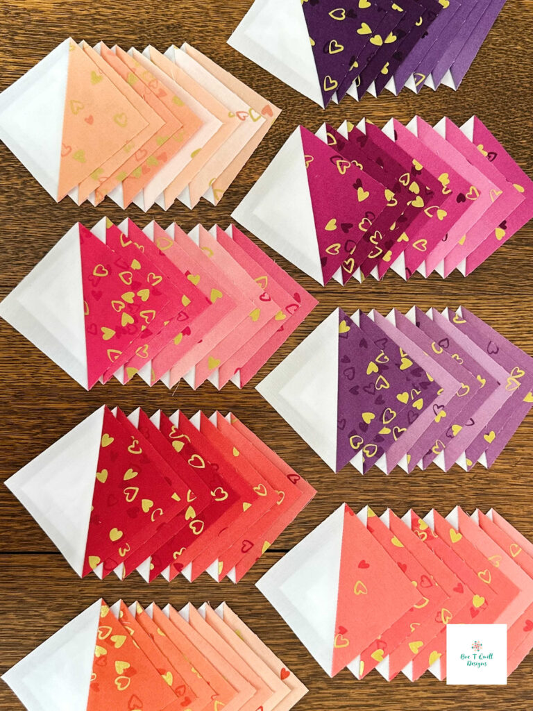 half-square triangles in a valentines fabric