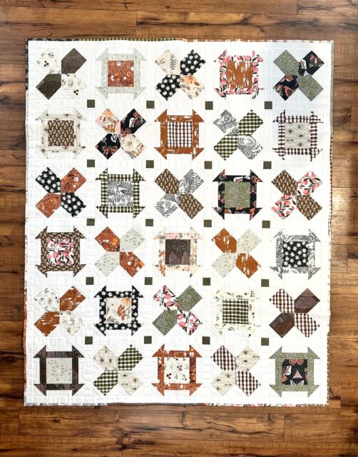 Meet the cover quilt! ✨

This version of Bare Roots is actually the one that inspired the name. I used the Roots of Nature collection by Bonnie Christine, and those mossy greens and earthy oranges just felt so right for this design.

Since it’s the Pattern of the Month, the PDF is still just $8 in the shop through the end of March.

I’d love to know—do you usually prefer bright, vibrant quilts or a more natural, earthy palette like this one? 

Fabric: Roots of Nature by Bonnie Christine
Pattern: Bare Roots (Link in bio)