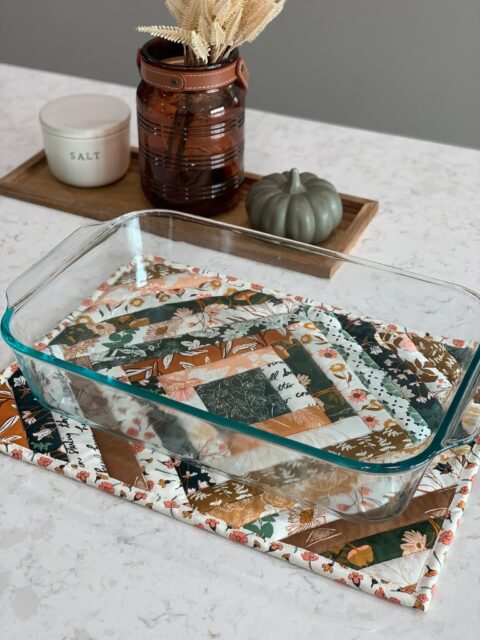 I really hate tossing out good fabric, especially when it’s from a collection I love as much as Roots of Nature. 🌿

After I finishing the Bare Roots cover quilt, I had enough scraps left over to whip up this casserole-sized hot pad. It’s such a quick little project and it feels so good to actually use up those odd-shaped strips that usually just end up at the bottom of a bin.

If you’re looking for a quick project between bigger quilts, I have a free pattern for this one linked in my bio.

Fabric: Roots of Nature by Bonnie Christine
Pattern: My free Casserole Hot Pad (Link in bio)