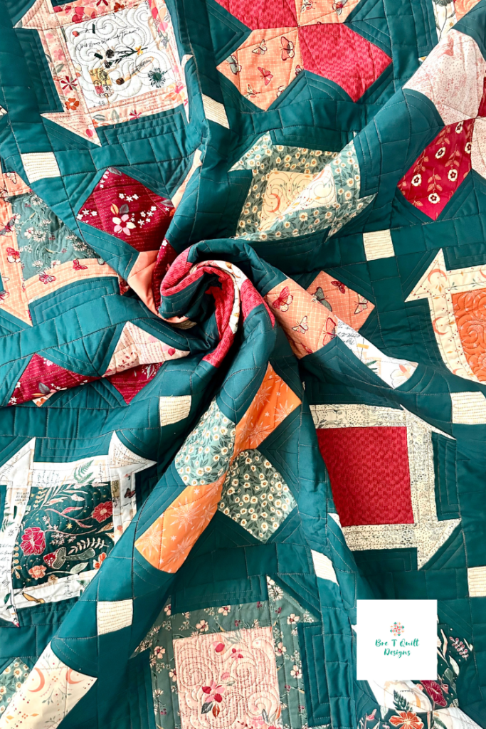 Quilt swirl of teal and red quilt
