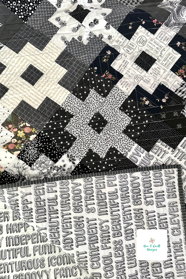 close up of black and white scrap quilt pattern front and back