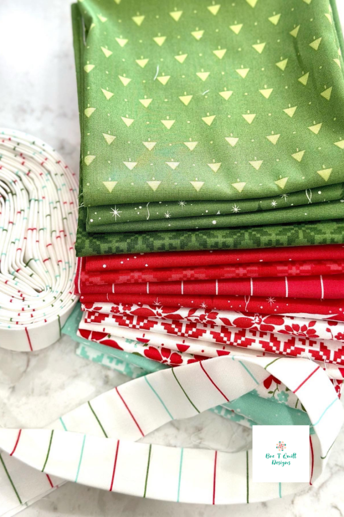 Red and green Christmas quilt fabrics and binding for the Letters For Santa quilt