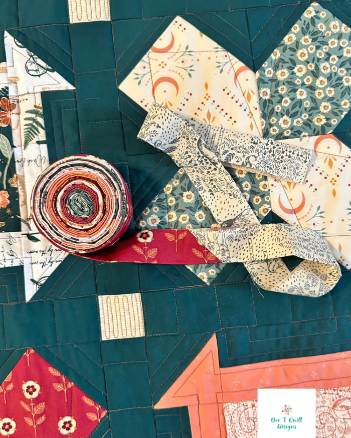 quilt binding close up ready to be sewn on teal bare roots heirloom quilt pattern